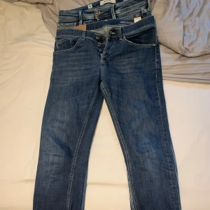 Domdup george - Nypris: 2500, inga fläckar eller hål, slim fit form/skinny W32L32