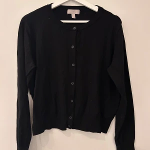 Kofta - Kofta med knappar framtill 