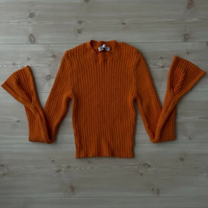 Orange tröja  - Kommer inte till användning! 