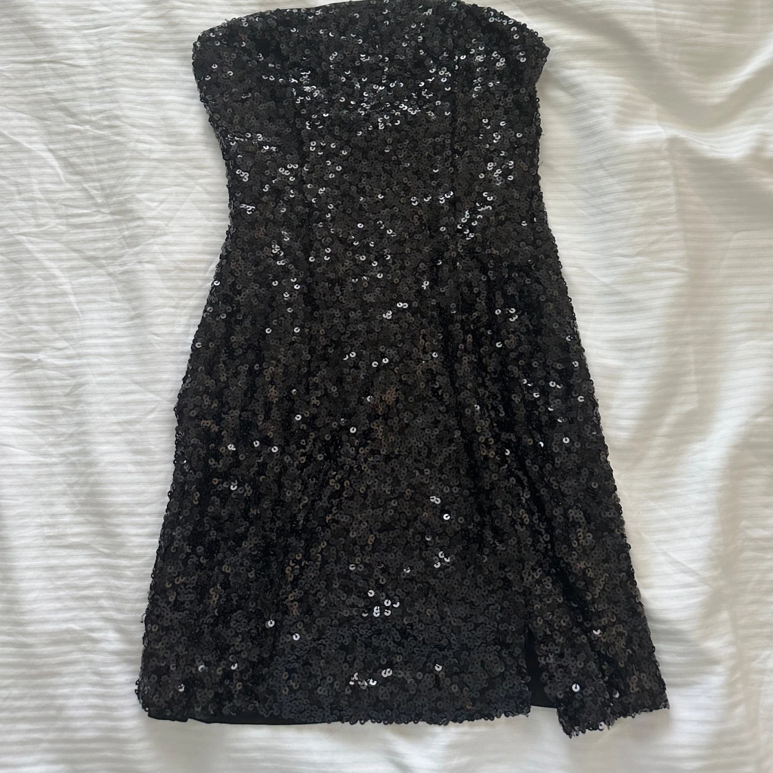 Glittrig klänning - 90