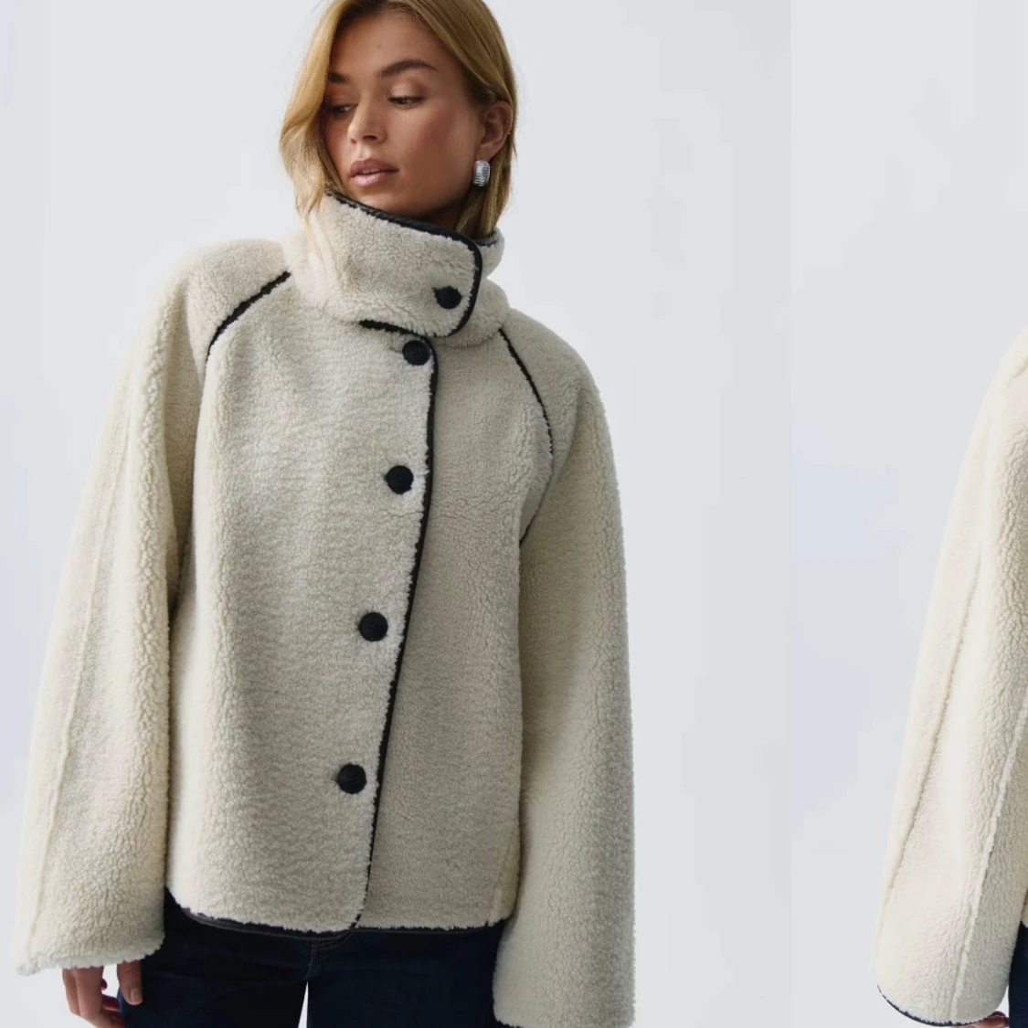 Beige teddyjacka med svarta detaljer