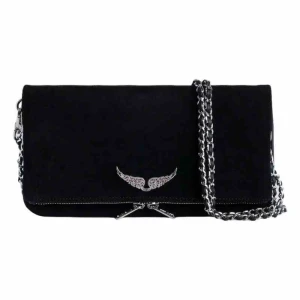 ZADIG & VOLTAIRE Rock Suede Clutch - Tänkte sälja min väska då jag inte använder den, har bara använt 3gånger och köpte den förra året. Den ser helt ny ut, inga sakdor eller liknanden, kan skicka detaljer bild om intresserad:)   Väskan heter :Rock Suede Clutch – Articles of leather; saddlery and harness; travel goods, handbags and similar containers 