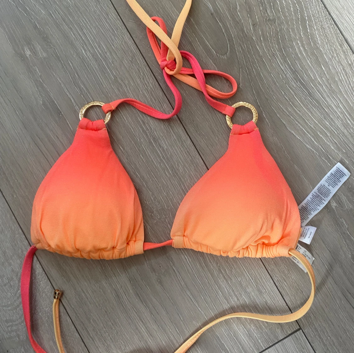 Orange och gul bikiniöverdel