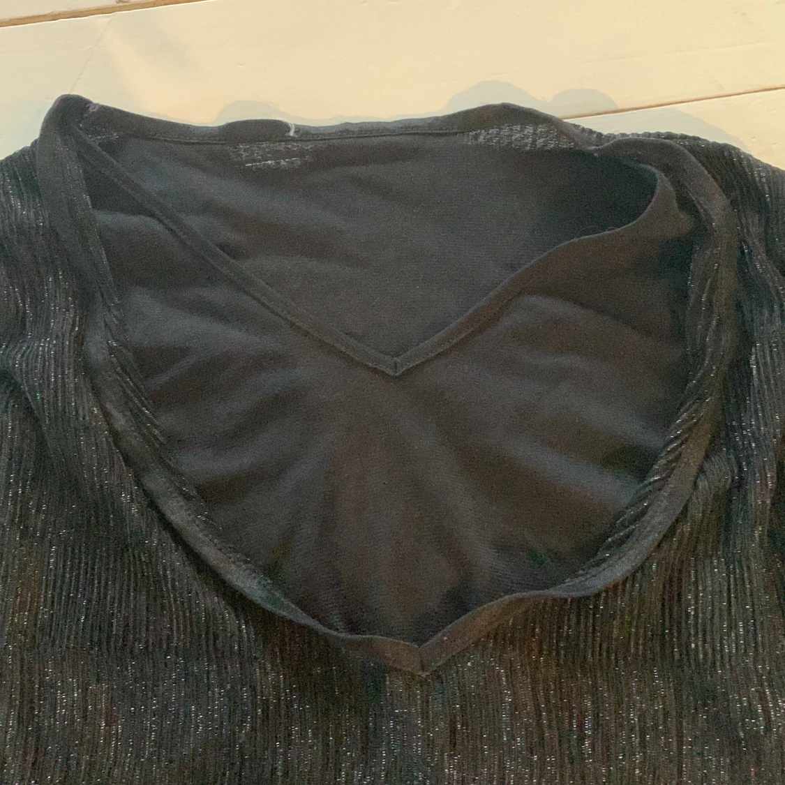 Svart glittrig långärmad topp - 90