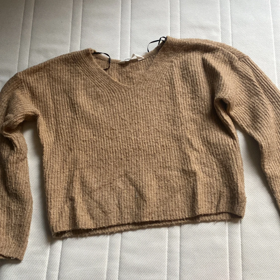 Stickad tröja