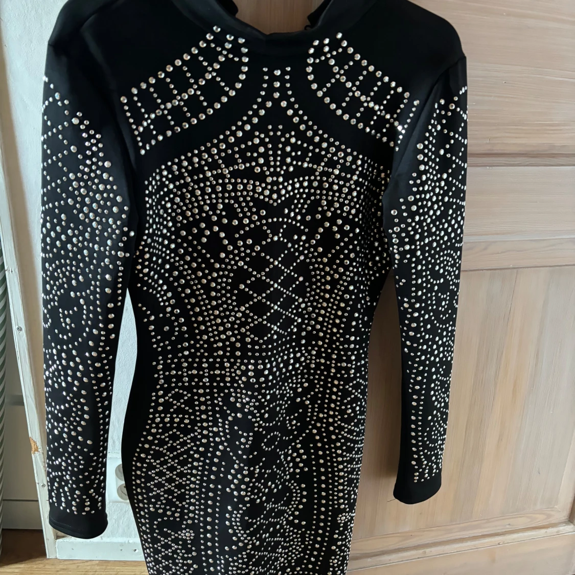 Svart klänning med paljetter