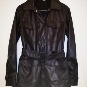 Skinnjacka  - I använt fint skick. 