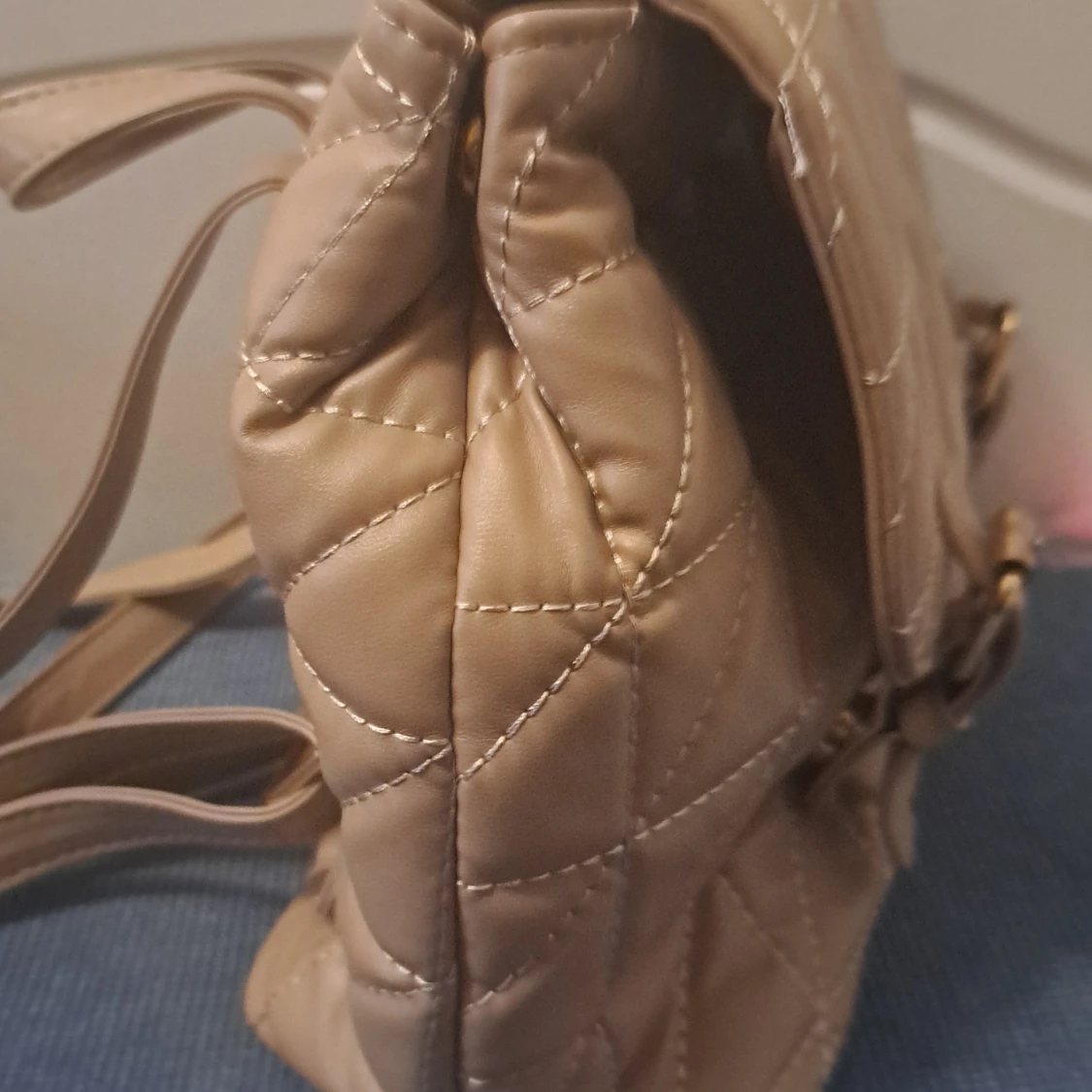 Beige quiltad ryggsäck - 91