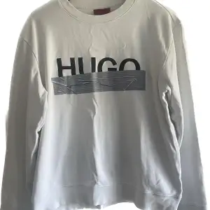 Cool och speciell Hugo buss sweatshirt. En tröja som får många blickar.