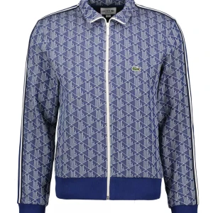 Lacoste trackjacket - Hej säljer denna Lacoste Allover Print Trackjacket, väldigt fint skicka! Sitter lite mindre än en L skulle säga mer som en M 