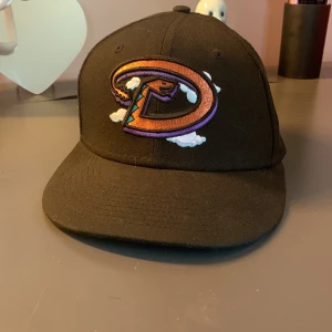 Keps - Aldrig använd  Storlek 7 