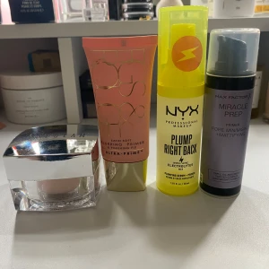 Fyra olika primers från Sheglam, NYX och Max Factor - Säljer fyra olika primers: Sheglam i en elegant burk, en rosa tub från Sheglam, NYX Plump Right Back i en gul flaska och Max Factor Miracle Prep i en svart och lila flaska. Perfekt för att förbereda huden för smink. Har använts