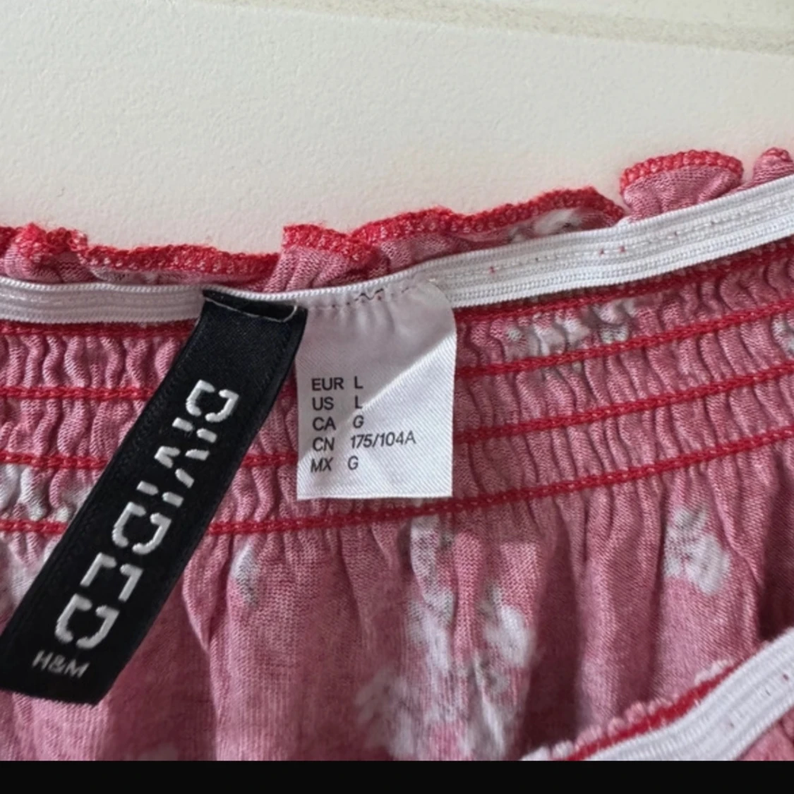 Röd blommig topp från H&M  - 92