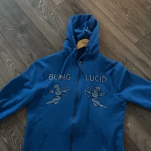 Bling lucid hoodie blå - 10 av 10 skick använd max 3 gånger