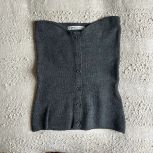 Oanvänd topp - Oanvänd bandou topp