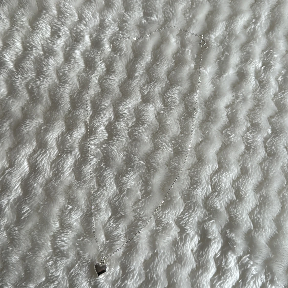 Halsband med en hjärta.