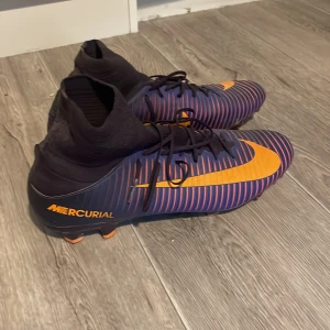 Nike Mercurial fotbollsskor - Nike mercurial Lila/orange. Använda 2 gånger
