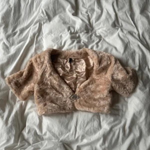  faux fur bolero  - never worn, has lost gems (see photo) but barely visible