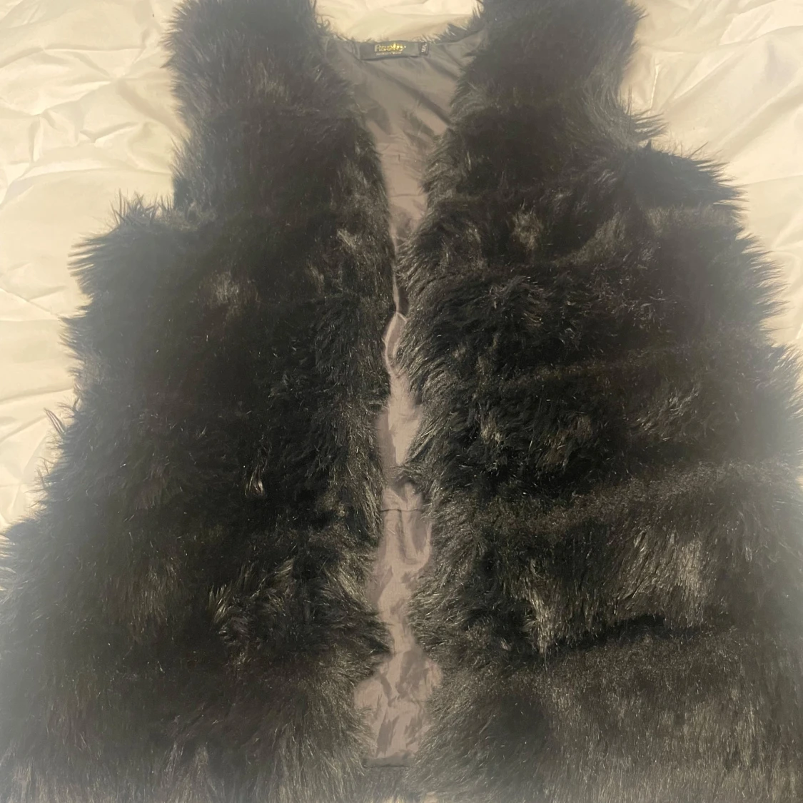 Svart pälsväst från Reality - 90