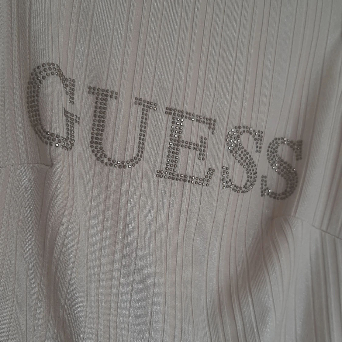 Topp från guess - 3