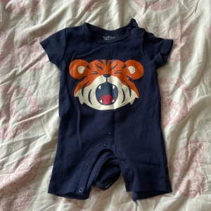 En tiger body i storlek 50-56 - En fin tiger body i storlek 50-56