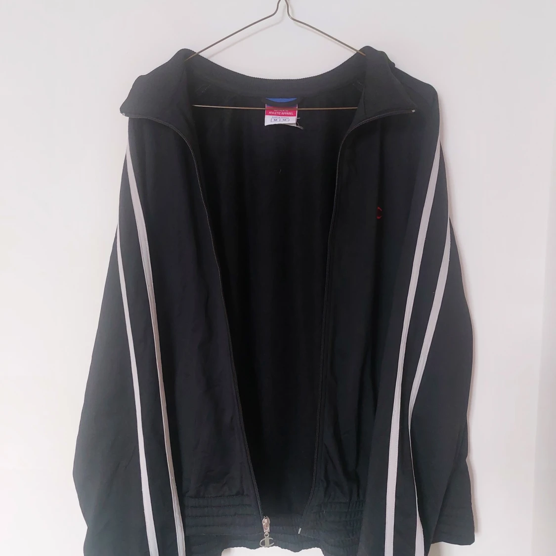 Svart zip-up jacka från Champion