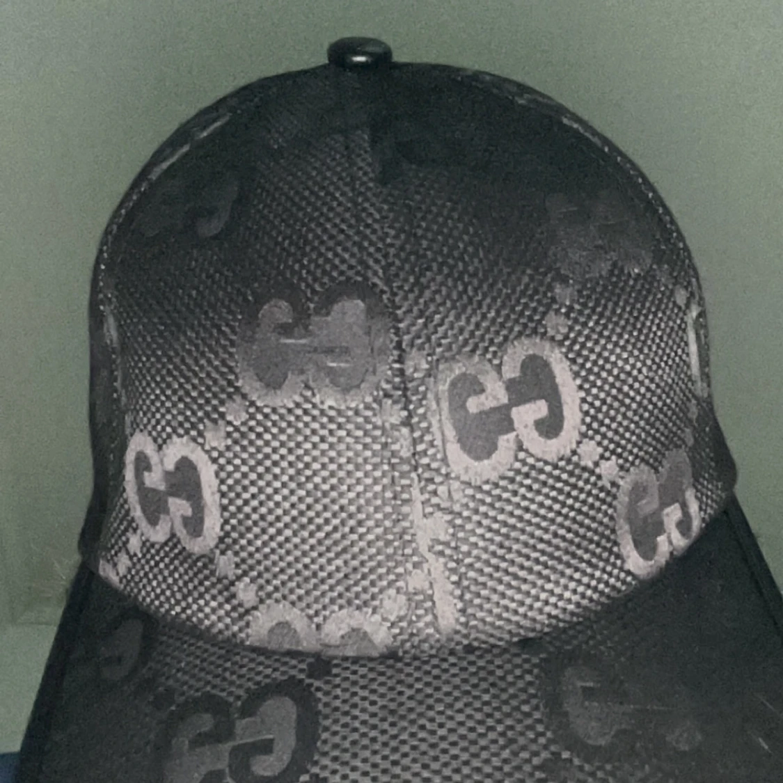 Svart keps från Gucci med GG-mönster - 1