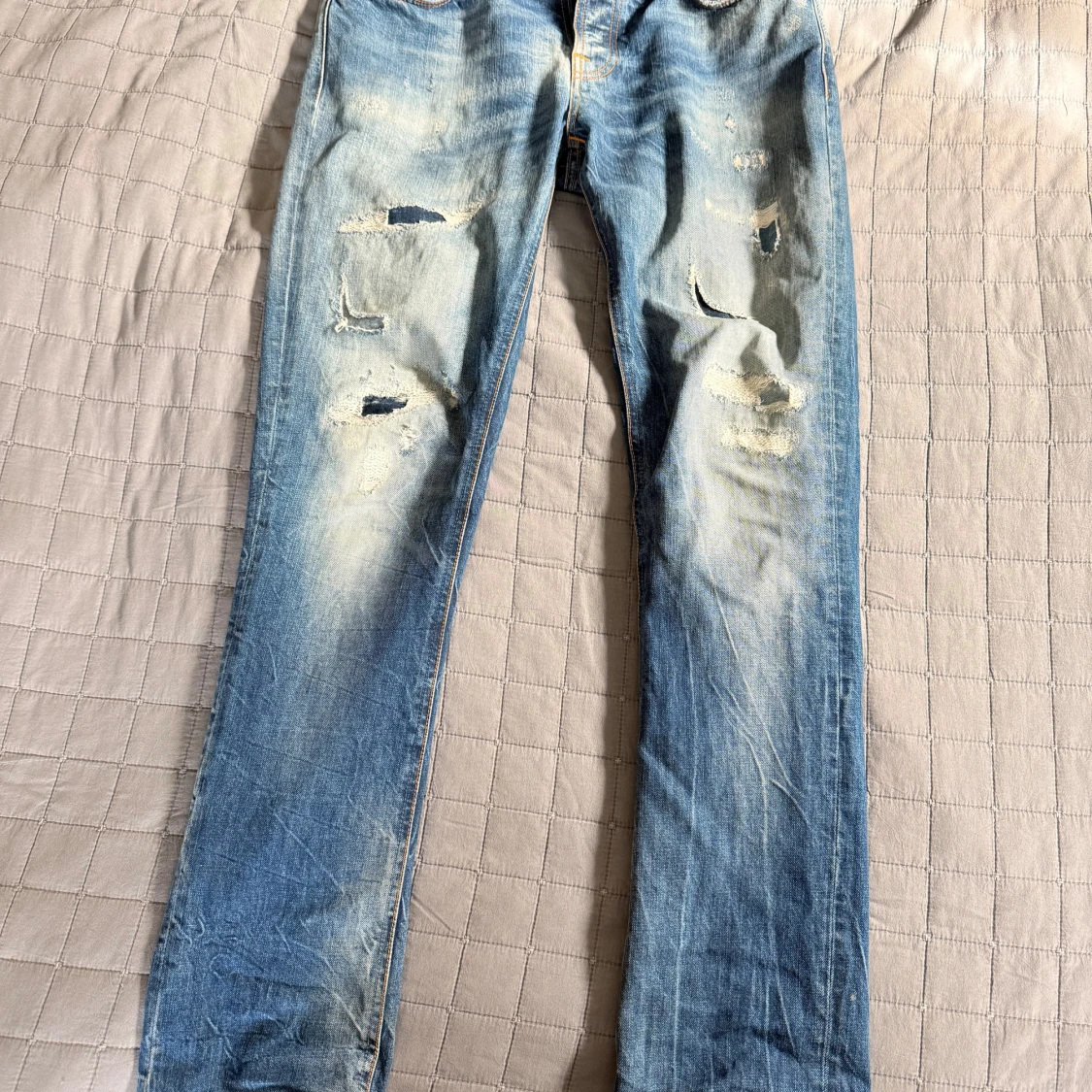 Blå slitna jeans från Nudie Jeans - 1