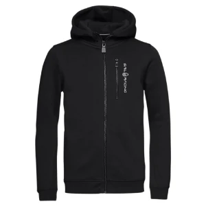 Svart hoodie med dragkedja från Sail Racing - Säljer en svart sail racing kofta den är använd och färgen på dragkedjorna som var svarta innan har blivit lite guld aktiga den är även lite sliten på den ena armen. Storlek 160 men passar xs också. 