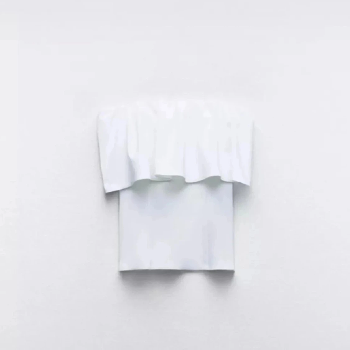 Vit bandeau tubtopp med volang