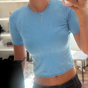 Ljusblå T-shirt  - I nyskick!