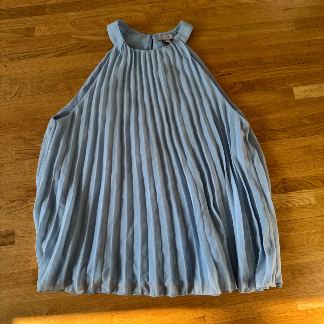 Ljusblå plisserad top H&M