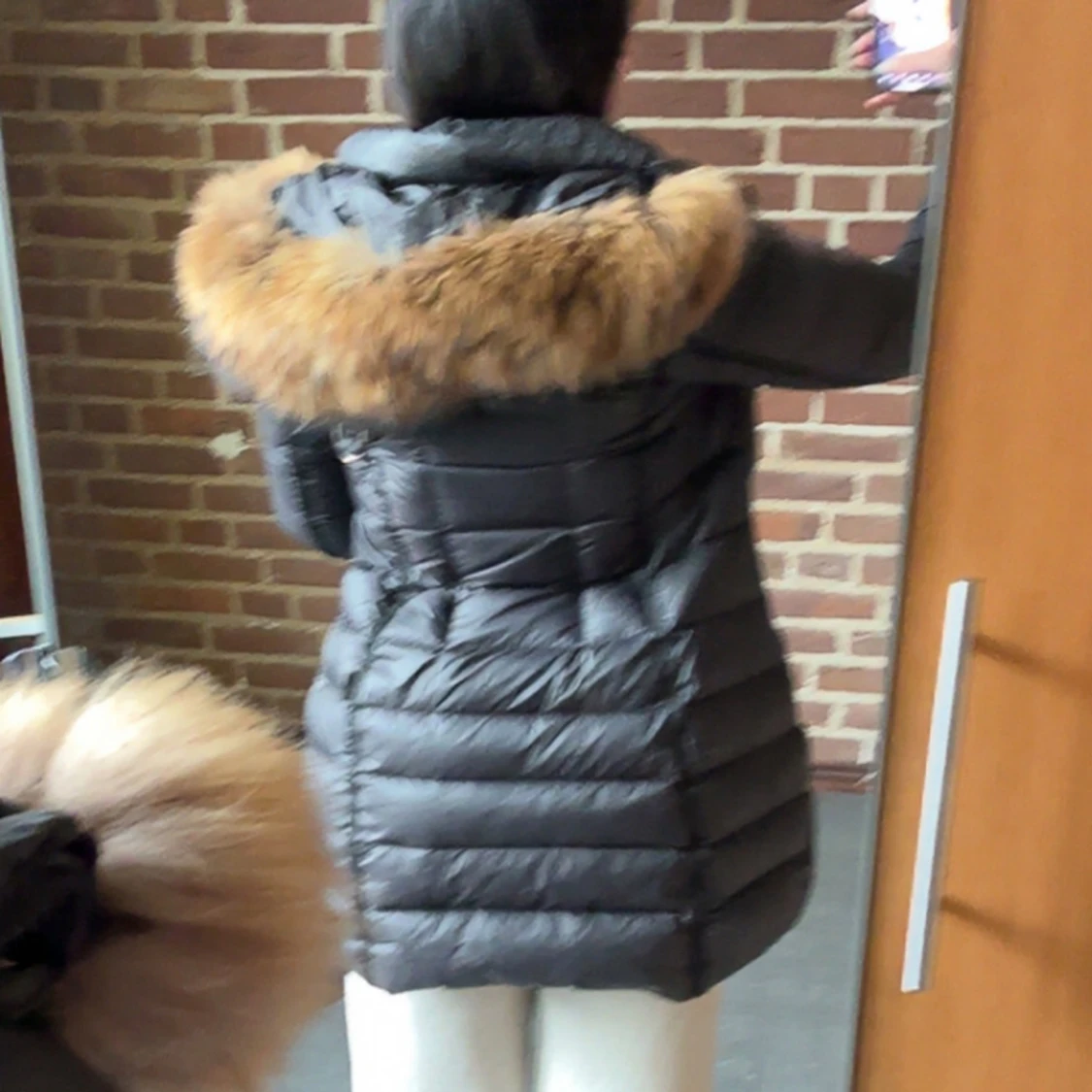 Svart dunjacka från Hollies - 1