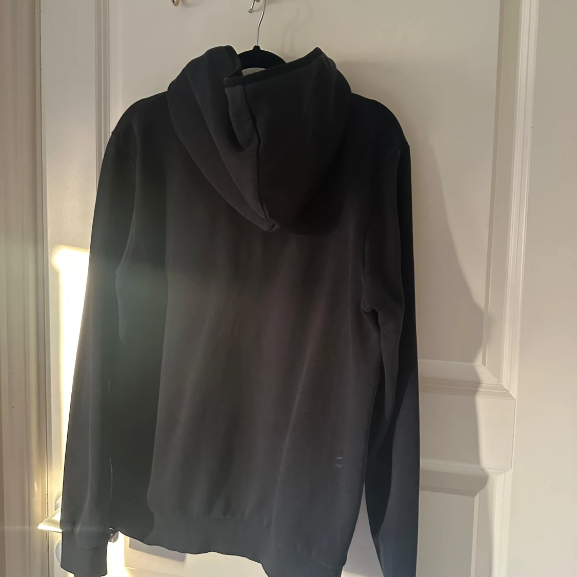 Svart hoodie Peak Performance L - 1