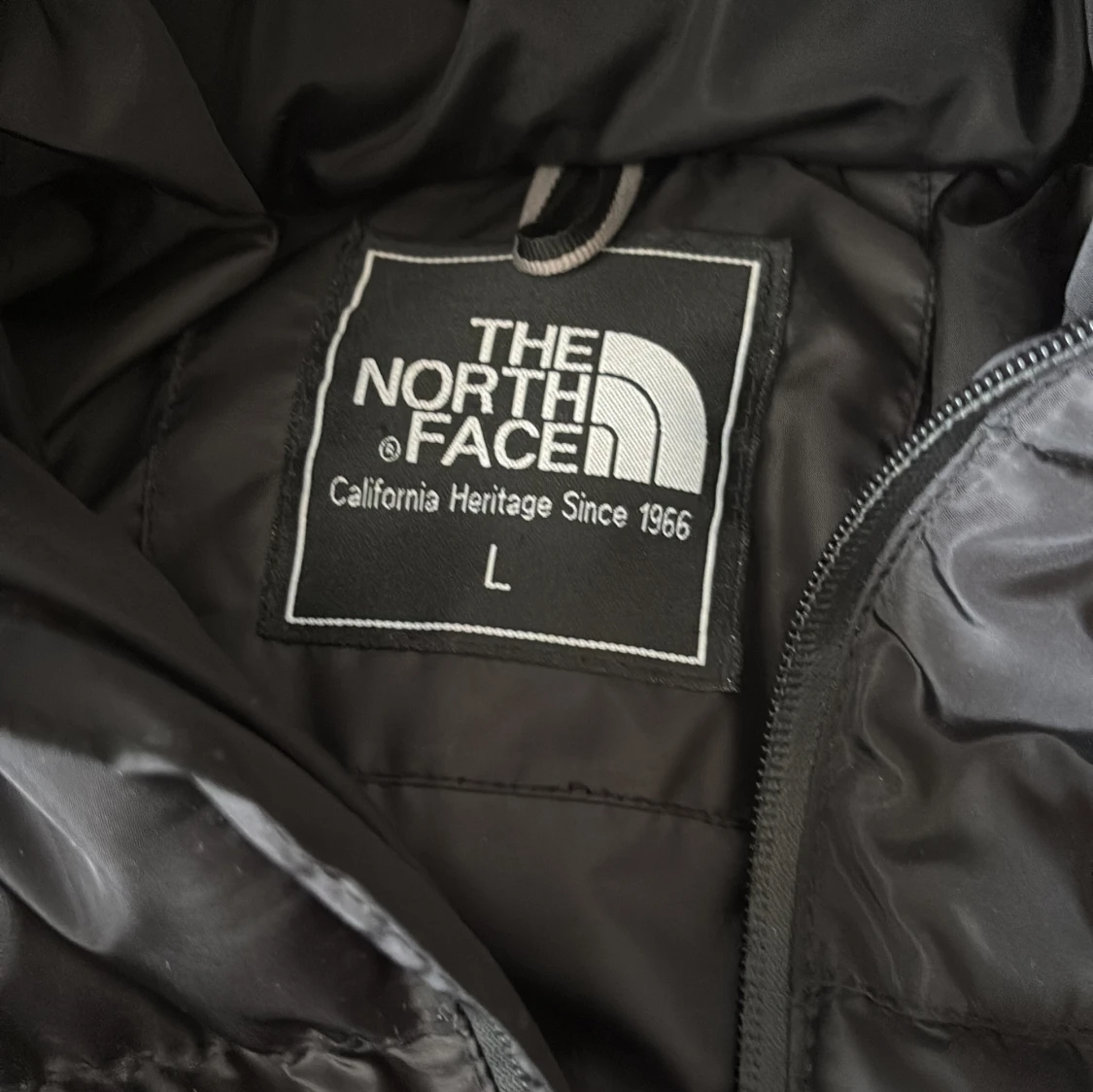 Svart pufferjacka från The North Face - 1