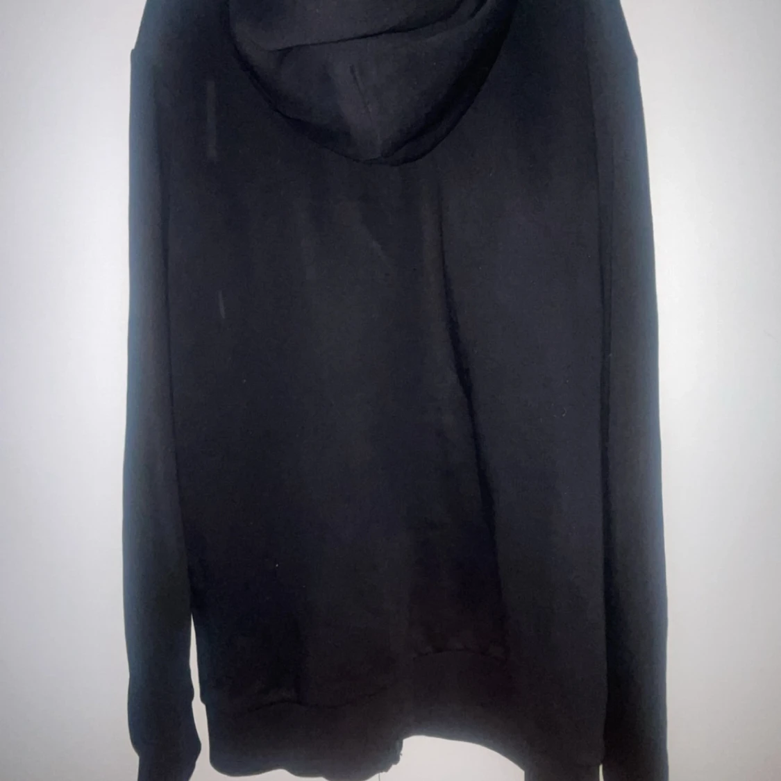 Svart hoodie från Peak Performance - 1