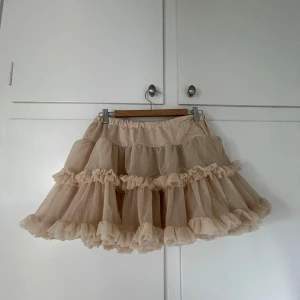 Ljusrosa volangkjol  - Trikå