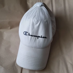 Champion keps - Champion keps (äkta) har användt den mycket.