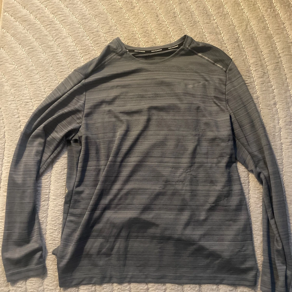 Grå långärmad tröja från Nike