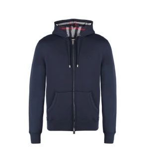 Marinblå hoodie från Burberry - Marinblå hoodie från Burberry med dragkedja framtill, huva med snörning och klassiskt rutigt foder i luvan. Den är liten i storleken så byter gärna mot något liknande som är större i S eller M
