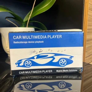 Car Multimedia Player - Säljer en Car Multimedia Player från Mobile Media Solutions. Den spelar MP3/WMA/FLAC/APE/WAV och har radio med auto store och förinställda stationer. Utrustad med elektronisk volymkontroll, stereo output och aux-ingång. Inkluderar fjärrkontroll och kablar. Perfekt för att uppgradera bilens ljudsystem!