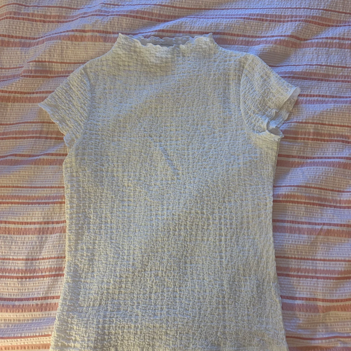 Vit smockad topp från Kappahl