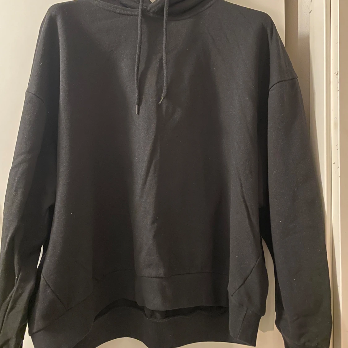 Svart hoodie från 157