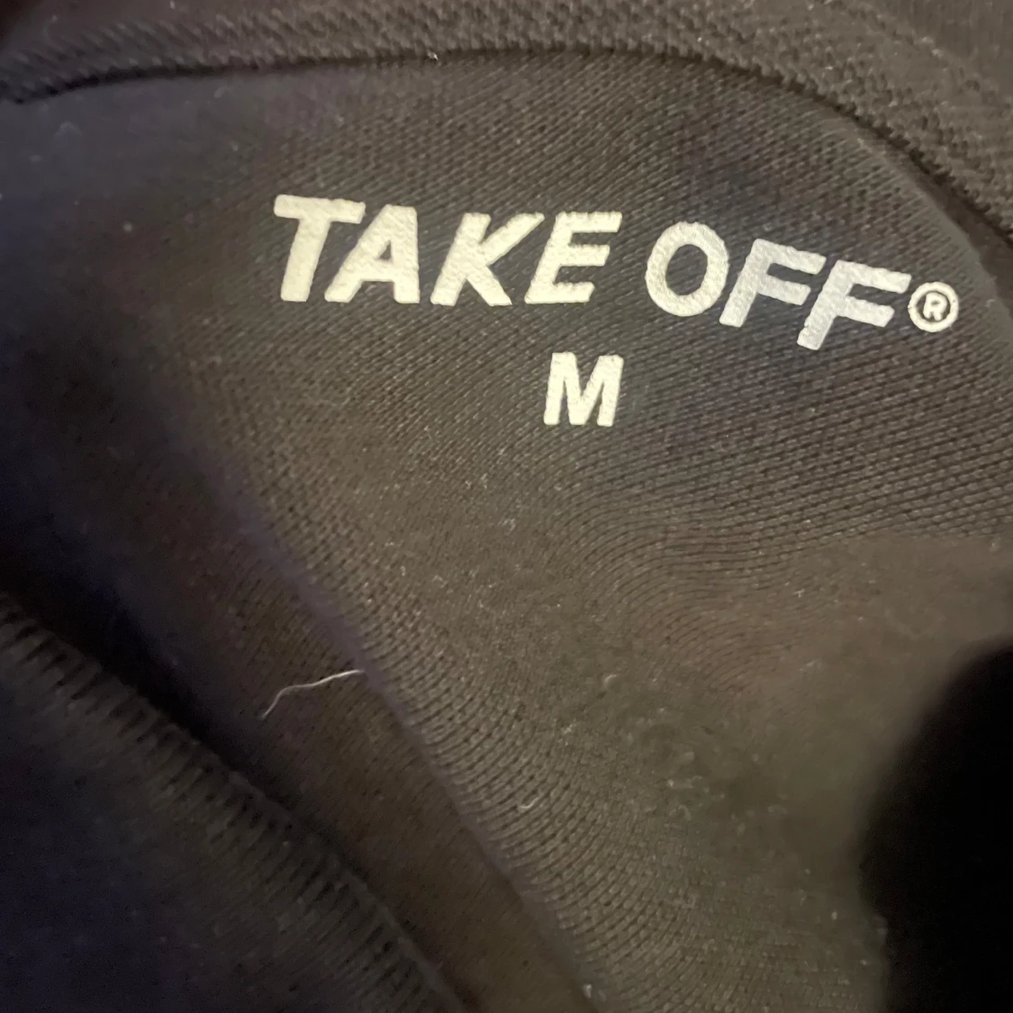 Svart pikétröja från Take Off - 2