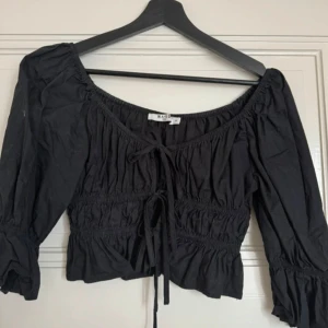 Topp med knyte - Använd 2 gånger