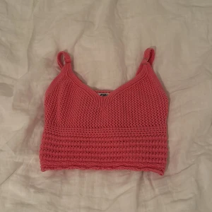 Rosa stickad linnetopp - Säljer en rosa stickat linne från New Yorker i storleken XS