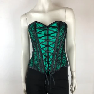 Korsett ( ej underklädeskorsett ) S - Helt ny korsett ( ej underklädeskorsett ). Snörning i ryggen. Storlek S.