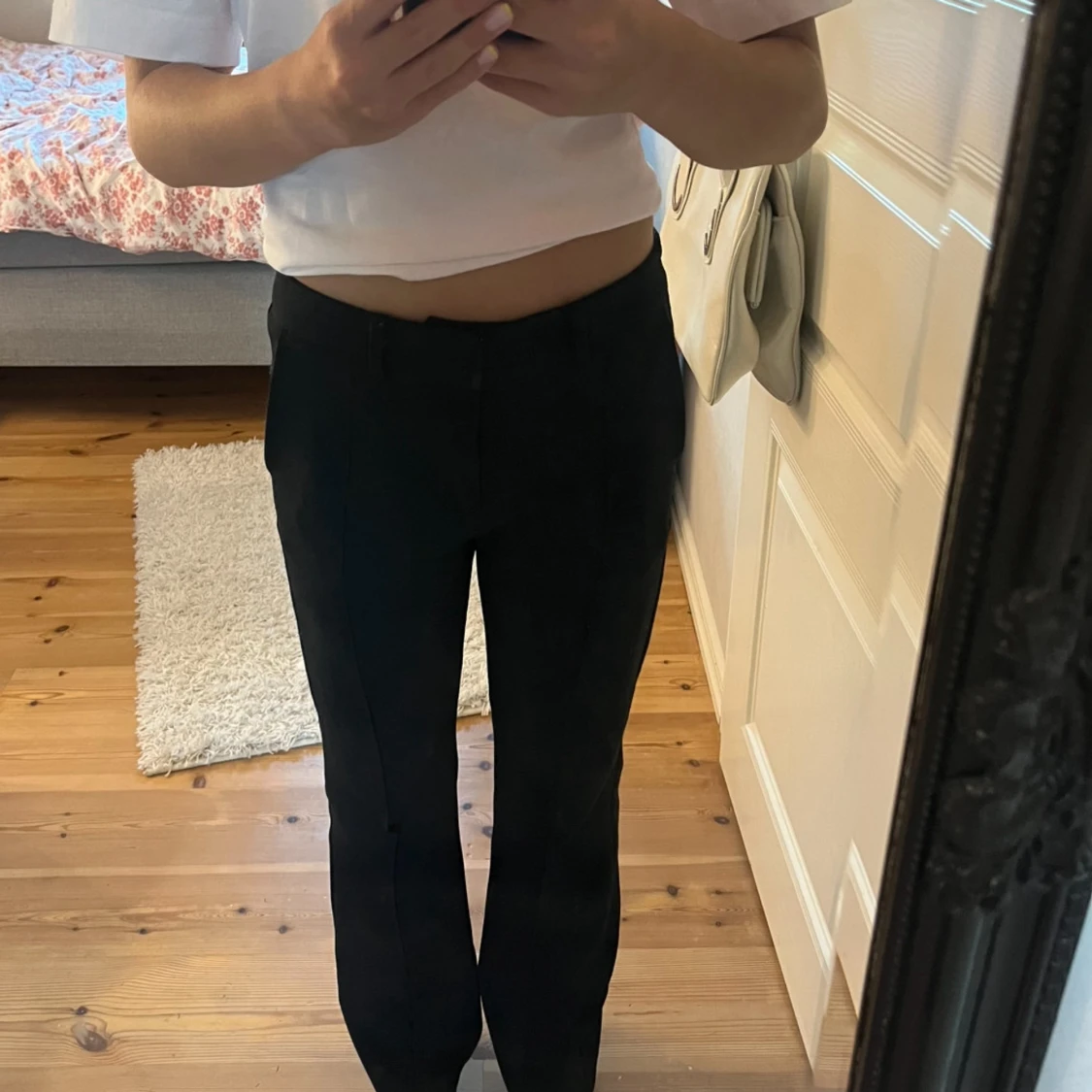 Svarta kostymbyxor med raka ben