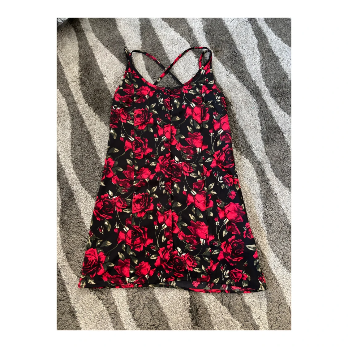 Blommig klänning i storlek 36