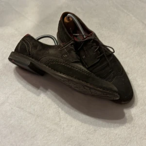 Mockskor - Skor mocka brunröda Lloyd stl 8